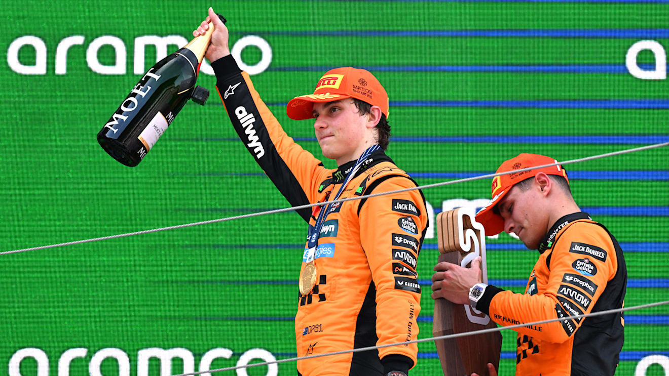 BARCELONA, SPAIN - JUNE 01: Race winner Oscar Piastri of Australia and McLaren and Second placed Lando Norris of Great Britain and McLaren on the podium during the F1 Grand Prix of Spain at Circuit de Barcelona-Catalunya on June 01, 2025 in Barcelona, Spain. (Photo by Mark Sutton - Formula 1/Formula 1 via Getty Images)